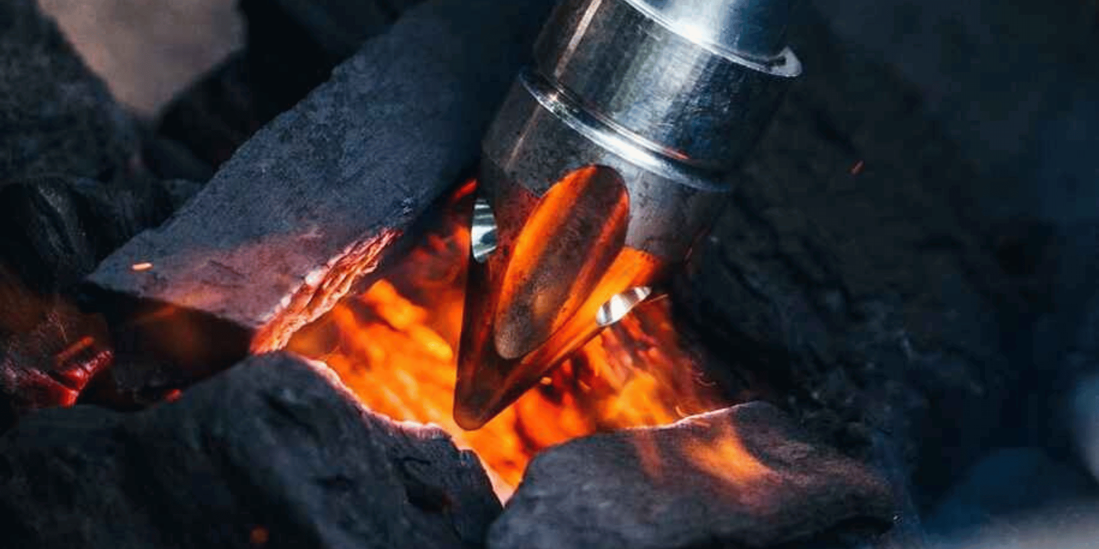 Close up of tri-flame cone tip of rocketfire - lighting charcoal