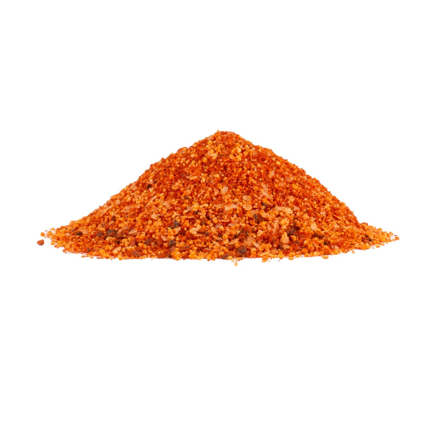 Pile of red pepper flakes on a white background