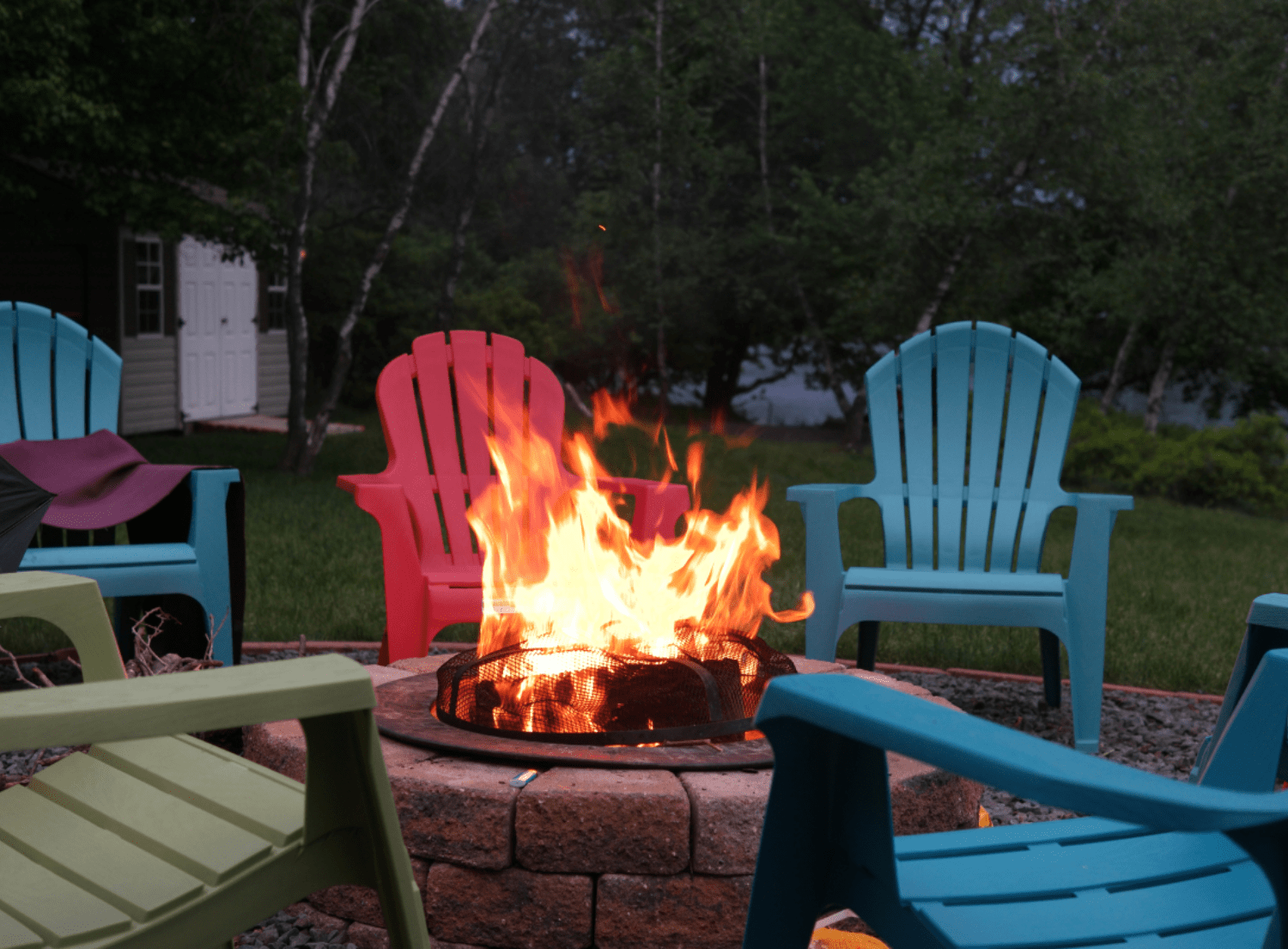 How to Build a Safe Fire Pit: Chairs Around Fire