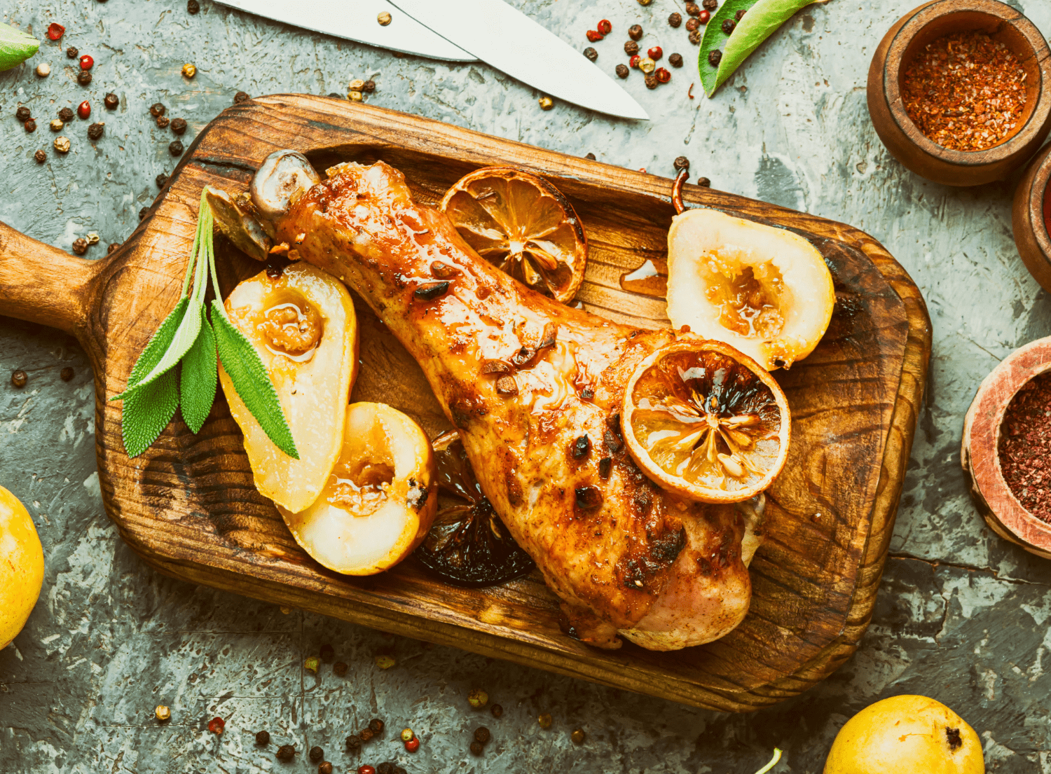 Grilled turkey leg on wooden tray