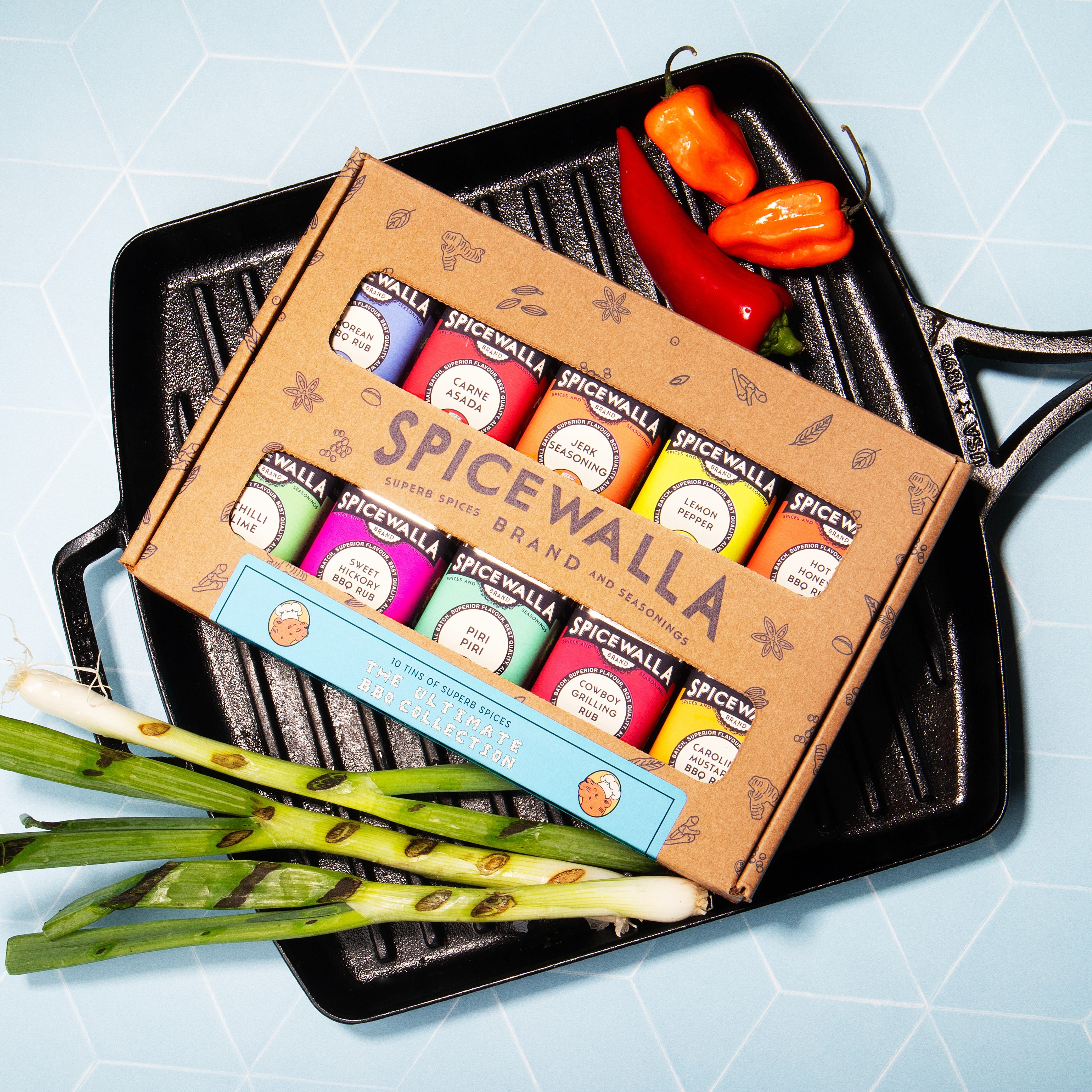 Spicewalla spice set on a grill with vegetables